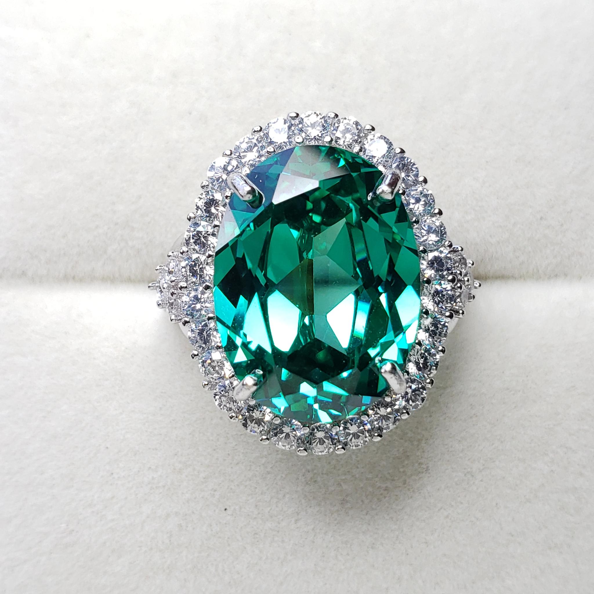 奇跡の輝き☆パライバトルマリン　人工宝石　12ｘ16　ヘイローリング　大粒サイズ　キラキラ　フリーサイズ　シルバー製